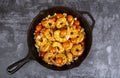 Cooked Spicy Garlicky Shrimps With Blistered Cherry Tomatoes and White Beans