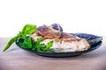 Cooked steak on wooden background