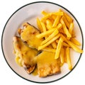 Cooked swordfish in hollandaise sauce with french fries close up Royalty Free Stock Photo