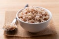 Cooked Thai brown rice in a bowl with spoon Royalty Free Stock Photo