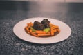 Cooked vegetables with ribs on whoite table on marble surface Royalty Free Stock Photo