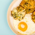 Cooked Vegetarian Bubble And Squeak Cakes With A Fried Egg Royalty Free Stock Photo