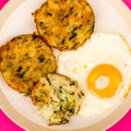 Cooked Vegetarian Bubble And Squeak Cakes With A Fried Egg Royalty Free Stock Photo