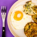 Cooked Vegetarian Bubble And Squeak Cakes With A Fried Egg Royalty Free Stock Photo