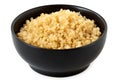 Cooked white quinoa in a black ceramic bowl isolated on white Royalty Free Stock Photo