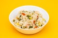 Cooked white rice mixed with colorful vegetables onion, green beans, tomato Royalty Free Stock Photo