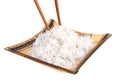 Cooked white rice and wood sticks Royalty Free Stock Photo
