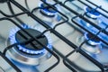 Cooker with blue gas flames Royalty Free Stock Photo