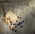 Cookie and coffee beens on sacks background