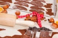 Cookie cutters, rolling pin and dough for Christmas cookies or gingerbread Royalty Free Stock Photo