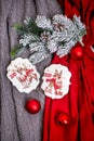 Cookie with deers and numbers 2019 on the background with fir branches and red balls, top view. Holiday sweets. New Year`s and Ch