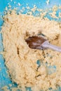 Cookie flour mixture in the bowl with black cooking chocolate