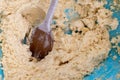 Cookie flour mixture in the bowl with black cooking chocolate