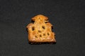 Cookie in form of a Halloween ghost house isolated on a black background Royalty Free Stock Photo