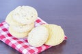 Cookie on plaid with wooden table background with copyspace. Royalty Free Stock Photo