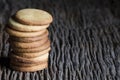 Cookie tower on a wooden board. Selective focus and space for copying Royalty Free Stock Photo