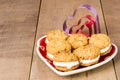 Cookie tray with filled cookies and cutters