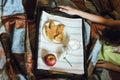 Cookies, apple and milk on a tray, healthy breakfast