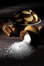 Cookies and barrel small with sugar on a dark wooden background Royalty Free Stock Photo