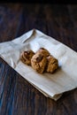 Cookies with Bran Flour and Raisin on Dark Wooden Surface