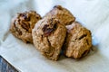 Cookies with Bran Flour and Raisin on Dark Wooden Surface