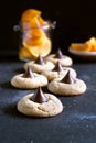 cookies with chocolate candy kiss, sliced orange pieces on background Royalty Free Stock Photo