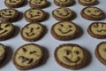 Cookies with chocolate faces, with chocolate smiles