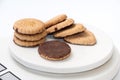 Cookies with chocolate filling on a digital scale Royalty Free Stock Photo