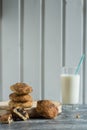 Cookies with chocolate, a glass of milk and a cocktail straw Royalty Free Stock Photo