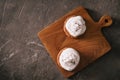 Cookies with cream cheese topping on rustic wooden table Royalty Free Stock Photo