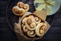 Cookies, curlicues, pretzels of puff pastry with sugar and cinnamon