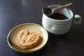 Cookies in the form of heart with coffee . Copy text menu food background