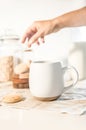 cookies and morning drink, coffee, milk or tea in light natural envoronment, kinfolk style breakfast Royalty Free Stock Photo