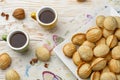 Cookies nuts with condensed milk and Turk with coffee on a wooden table in vintage style