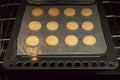 Cookies in the oven Royalty Free Stock Photo