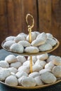 Cookies with powdered sugar on two level tray