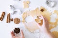 Cookies preparations, female hand and spicy ingredients Royalty Free Stock Photo