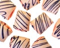 Cookies rolls with strawberry jam and chocolate icing top view Royalty Free Stock Photo