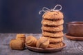 Cookies lying on the table and a Cup of ceramics Royalty Free Stock Photo