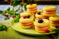 Cookies sandwiches with pink cream and wildberry Royalty Free Stock Photo