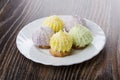 Cookies with souffle and coconut flakes in plate