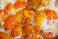 Cooking apricots and peach jam Royalty Free Stock Photo