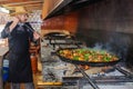 Cooking of an authentic paella in Valencia, Spain
