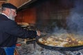 Cooking of an authentic paella in Valencia, Spain