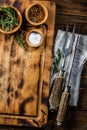 Cooking background concept. Vinrage cutting board with cutlery. Top view Royalty Free Stock Photo