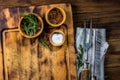 Cooking background concept. Vinrage cutting board with cutlery. Top view Royalty Free Stock Photo