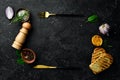 Cooking background. Vegetables, spices and kitchen utensils on a stone background. Royalty Free Stock Photo