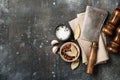 Cooking background with vintage butcher cleaver, spice shakers and spices Royalty Free Stock Photo