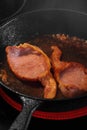 Cooking bacon in a frying pan
