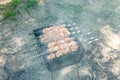 Cooking barbecue with vegetables on skewers. Roasted meat on the grill